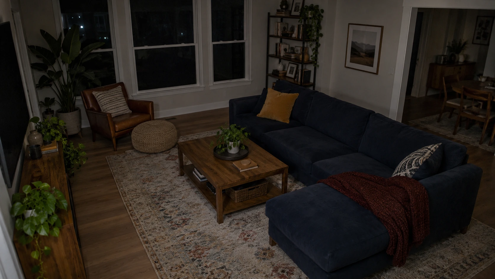 Illustrative colour night view of an indoor living room