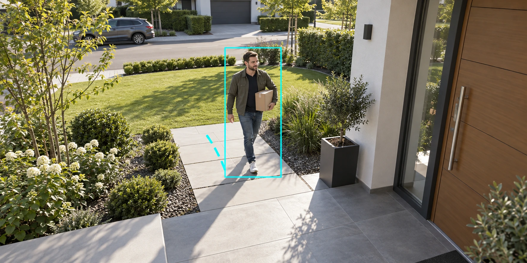 Delivery visitor highlighted by a human-detection box on a garden path